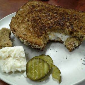 Quesso Fresco Grilled Cheese on Multi-grain. With sweet pickle chips.